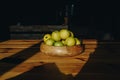 Healthy green food with apples on wood plates desk background mock up Royalty Free Stock Photo