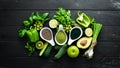 Healthy Green food Clean eating selection Protein source for vegetarians: avocado, lime, onion, apple, kiwi, spirulina.