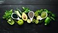 Healthy Green food Clean eating selection Protein source for vegetarians: avocado, lime, onion, apple, kiwi, spirulina.