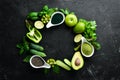 Healthy Green food Clean eating selection Protein source for vegetarians: avocado, lime, onion, apple, kiwi, spirulina.