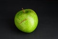 Healthy green granny smith apple, on a black background Royalty Free Stock Photo