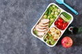 Healthy green meal prep containers with chicken fillet, rice, brussels sprouts Royalty Free Stock Photo