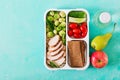 Healthy green meal prep containers with chicken fillet, rice, brussels sprouts and vegetables Royalty Free Stock Photo