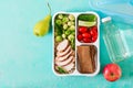 Healthy green meal prep containers with chicken fillet, rice, brussels sprouts and vegetables Royalty Free Stock Photo