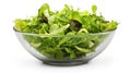 Healthy green salad in a clear glass bowl