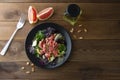 Healthy green salad with grapefruit, lose weigh food. Diet plan. Wooden rustic table. Copy space