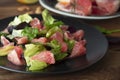 Healthy green salad with grapefruit, lose weigh food. Diet plan. Wooden rustic table