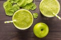 Healthy green smoothie with apple on rustic wood background Royalty Free Stock Photo