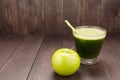 Healthy green smoothie with apple on rustic wood background Royalty Free Stock Photo