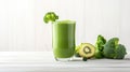 a healthy green smoothie, featuring broccoli, elegantly presented in a glass on a white wood background. The composition