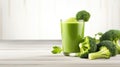 a healthy green smoothie, featuring broccoli, elegantly presented in a glass on a white wood background. The composition