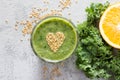 Healthy green smoothie with heart of seeds linseed Royalty Free Stock Photo