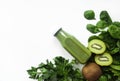 Healthy green smoothie or juice and ingredients on white - superfoods, detox, diet, health, vegetarian food concept. Copy space Royalty Free Stock Photo
