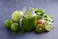 Healthy green smoothie with kiwi, apple, spinach and chia seeds.