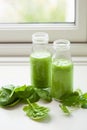 Healthy green spinach smoothie with cilantro lime banana ginger Royalty Free Stock Photo