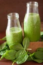 Healthy green spinach smoothie with lemon orange Royalty Free Stock Photo