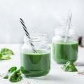 Healthy green vegan smoothie with spinach, spirulina and chia seeds Royalty Free Stock Photo