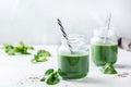 Healthy green vegan smoothie with spinach, spirulina and chia seeds Royalty Free Stock Photo