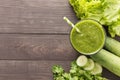 Healthy green vegetables smoothie on rustic wood background Royalty Free Stock Photo