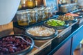 Healthy greens desk with natural vegetables and other food in the buffet