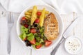 Healthy grilled chicken breast served with grilled potatoes and fresh vegetables Royalty Free Stock Photo