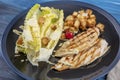 Healthy Grilled Chicken Caesar Salad with Cheese and Croutons Royalty Free Stock Photo