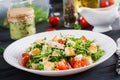 Healthy grilled chicken Caesar salad with tomatoes, cheese and croutons. Royalty Free Stock Photo