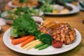Healthy grilled vegetable and fresh salad serving with Barbeque grilled chicken breast steak
