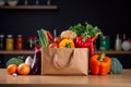 Healthy grocery scene Fresh vegetables in paper bag on table Royalty Free Stock Photo