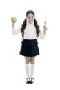 Healthy habits. Girl cute holds toothbrush and apple white background. Brush teeth concept. Child girl smiling face