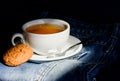 Healthy habits. Tea time concept. Cup mug hot water and bag of tea. Mug filled boiling water and tea bag on blue jeans