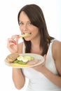 Healthy Happy Natural Young Woman Eating a Plate of Norwegian Style Breakfast Royalty Free Stock Photo