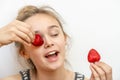 Healthy happy smiling woman eating strawberry. Healthy, lifestyle concept