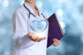 Healthy heart in the hand of the doctor. Royalty Free Stock Photo