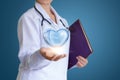 Healthy heart in the hand of the doctor. Royalty Free Stock Photo