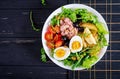 Healthy hearty salad of tuna, green beans, tomatoes, eggs, potatoes, black olives Royalty Free Stock Photo