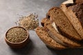 Healthy Hemp bread, hempseeds on brown background.