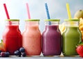 Healthy high fiber fruit and berry smoothies in bottles.Macro.AI Generative