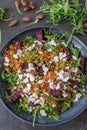 Healthy home made couscous salad with sweet potato, beetroot and feta cheese Royalty Free Stock Photo