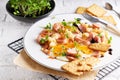 Healthy homemade breakfast. eggs with sausages , spices ,arugula served in a plate Royalty Free Stock Photo