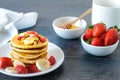 Healthy homemade breakfast with pancakes and fruits