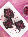 Healthy homemade brownie with crispy raspberries chips Royalty Free Stock Photo