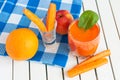 Healthy homemade carrot juice in glass and fresh