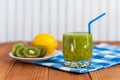 Healthy homemade kiwi juice in glass and fresh