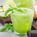 Homemade lemonade with cucumber, basil, lemon, honey and sparkling water, square format Royalty Free Stock Photo