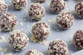 Healthy homemade paleo chocolate energy balls on tray, horizontal