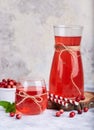 Healthy cranberry juice drink and fresh cranberries. Traditional Russian beverage mors