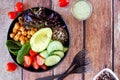 Healthy homemade salad bowl table scene on a wood background Royalty Free Stock Photo