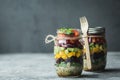 Healthy homemade salad in mason jar with quinoa and vegetables. Healthy food, clean eating, diet and detox. Copy space Royalty Free Stock Photo