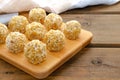 Healthy homemade sweet energy balls of dried fruits and nuts in coconut. The composition of dried apricots, raisins, figs, dates, Royalty Free Stock Photo